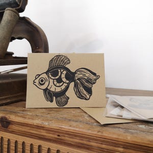 Carte poisson illustration linogravure