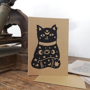 Carte chat cosmique illustration linogravure
