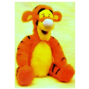 May include: A plush orange and yellow tiger stuffed animal with black stripes. The tiger has a white nose and a friendly smile.