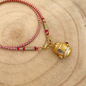 Indian Protective, Purifying Talisman 24k Gold Plated Bell Amulet with Smoky Quartz & Garnet Gemstones, Zirconia crystals on Indian Dori