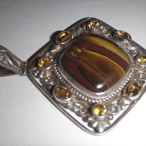 Tiger eye sterling silver pendant with citrines.