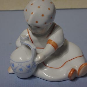 ZSOLNAY Porcelain figurine 1960s &quot;Girl with a jug&quot;. Manufactured by ZSOLNAY (Hungary)