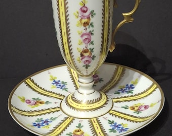 Antique Limoges Pedestal China Cup and Saucer: Hand-Painted Gold and flowers.