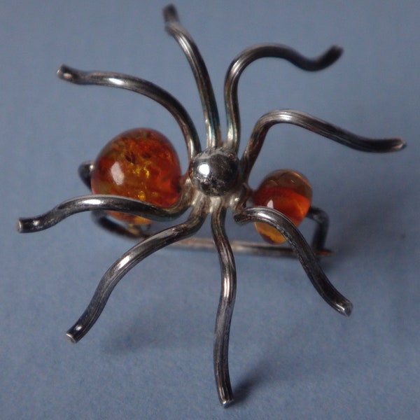 Sterling  with amber spider pin brooch.