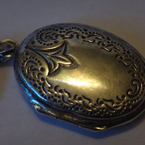 Sterling silver locket.