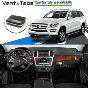 May include: A black vent tab accessory for Mercedes ML and GL models, years 2012-2015. The tab is designed to hold a phone or other device in the car's air vent.