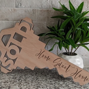 SOLD Key Sign