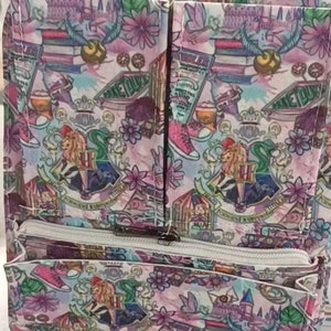 May include: A multi-pocket backpack with a colorful pattern featuring elements from the Harry Potter series. The design includes images of the Hogwarts crest, books, sneakers, and flowers. The backpack has a white zipper and multiple compartments.