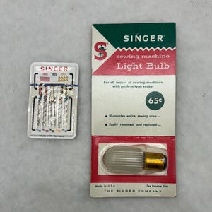 Vintage Singer Sewing Machine Light Bulb Style L and Needles - 2 items
