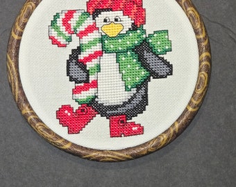 Penguin with candy cane