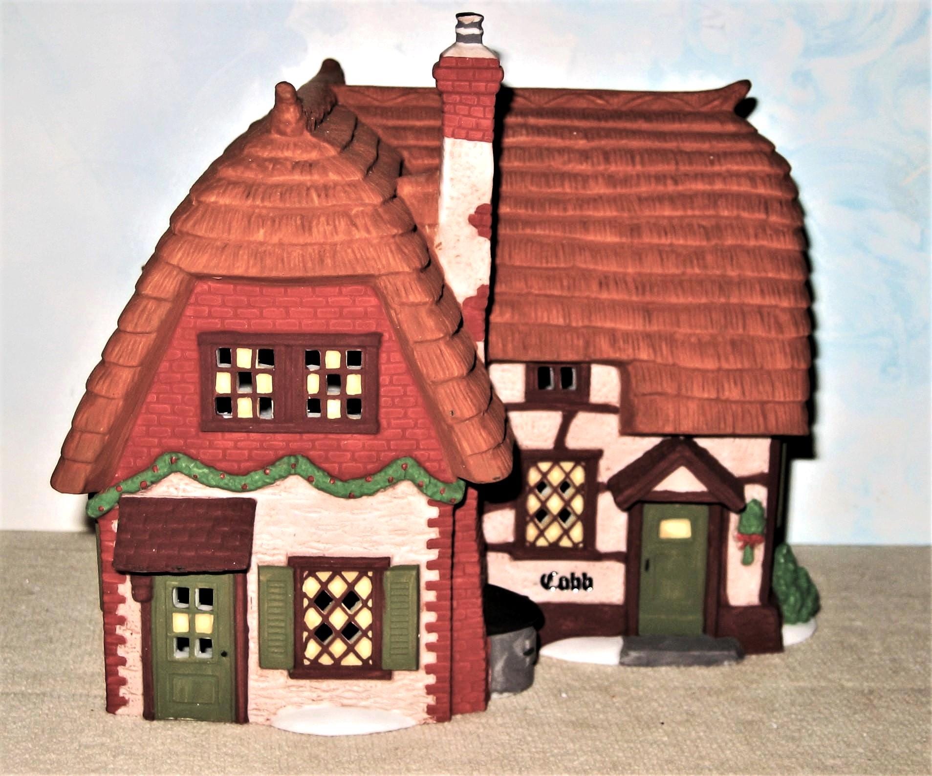 Dept 56 Mr & Mrs Pickle 58246 retired Portobello Rd Thatched  Dickens\' Village Portobello Road Thatched Cottages - Set of 3 main image 1