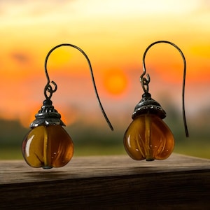 Handcrafted Amber Glass Dangle Earrings – Vintage Boho Chic with Ornate Silver Caps