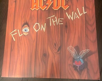 AC/DC『フライ・オン・ザ・ウォール』LP AC/DC - Fly On The Wall - Amazon.com Music