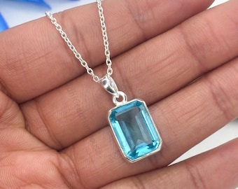 Emerald Cut 10x14mm Blue Topaz Pendant: Sterling Silver December Birthstone