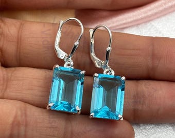 Emerald Cut Blue Topaz Lever Back Earrings: Sterling Silver December Birthstone