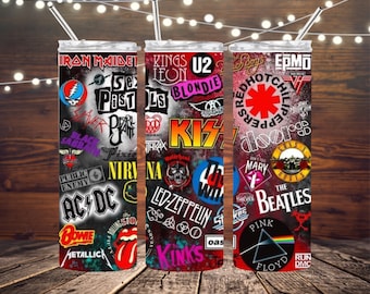 May include: Three stainless steel tumblers with colourful designs featuring logos of popular rock bands, including Iron Maiden, AC/DC, Nirvana, KISS, Led Zeppelin, The Beatles, Pink Floyd, and more.