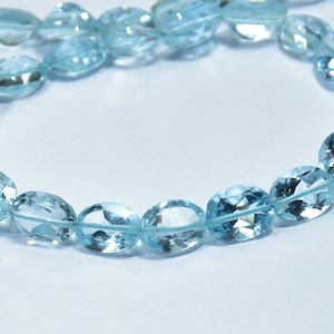 Verbazingwekkende kleur natuurlijke blauwe topaas ovale vorm gefacetteerde edelsteen kralen 13 inch gewicht - 65,85 karaat stukjes - 43 maat - 6 × 8 mm