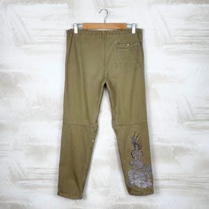 Pantalones Maharishi, estilo urbano japonés, con bordado de dragón, de uso militar, color caqui, algodón Riri Hardware, estilo vintage, con pernera ajustable, talla XL.