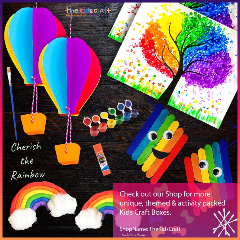 May include: A rainbow-themed craft kit with hot air balloons, a rainbow tree, a rainbow popsicle stick craft, and rainbow play dough. The kit includes paint, glue, and other craft supplies. "Cherish the Rainbow" is written on the image.