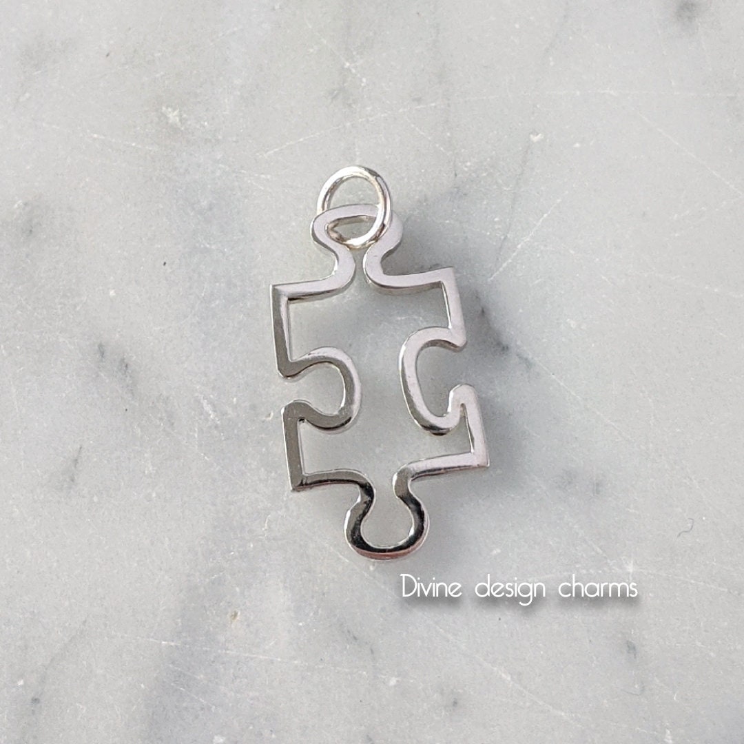 Small Autism Awareness Puzzle Piece Charm With 2 Open Hearts In Sterling Silver