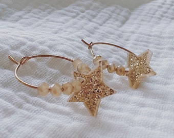 Orecchini scintillanti con stella e perle di vetro