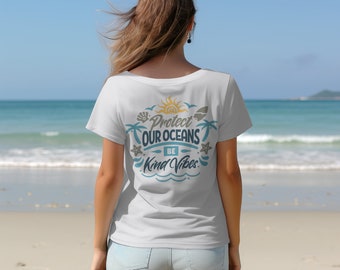 May include: White t-shirt with a blue and yellow graphic print that says "Protect Our Oceans Be Kind Vibes".