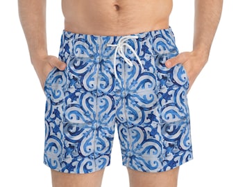 May include: Blue and white patterned swim trunks with a white drawstring.