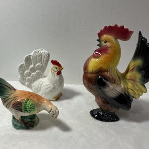 Vintage ceramic chickens and rooster.