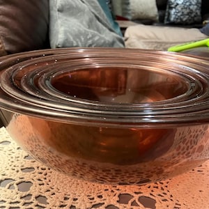 Vintage Pyrex Cranberry Visions Linie Nistschalen.  4er Set.