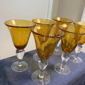 Vtg. large hand blown 8” Amber water goblets by Artland. Set of 6
