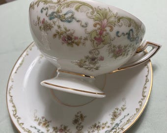 Vintage JR Bavaria miniature pink flowers with leaves and blue ribbons cup and saucer
