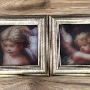 Vintage framed art.  Pair of cherubs