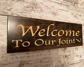 Carved Wood "Welcome To Our Joint" Sign - Dark Walnut Stain