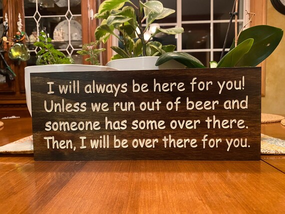 Hand-carved pine beer sign for the man cave — actual carving craft (not vinyl or print), 23 favorites, and it looks like someone spent real hours making it.