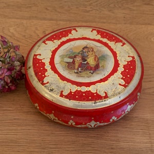 Caja de hojalata coleccionable con lata de caramelos vintage