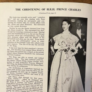 May include: A black and white photograph of a young Prince Charles being christened. The photo shows Prince Charles in a white gown with a lace collar and a crown on his head. The photo also shows the Queen, the King, and other members of the royal family.