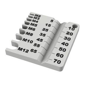 May include: A white plastic tool for measuring the size of nuts and bolts. The tool has a ruler on one side and a series of slots on the other side, each labelled with a different metric size, from M2 to M12. The ruler is marked in millimetres, from 5 to 70.