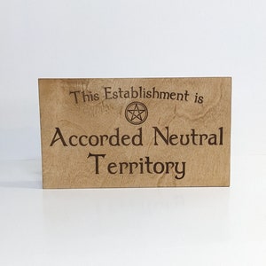 Accorded Neutral Territory - Wood Burned Sign