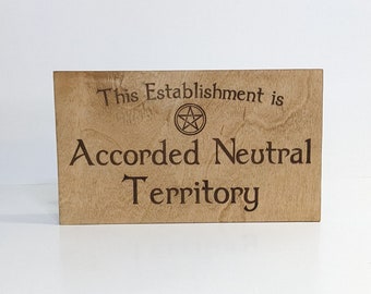 Accorded Neutral Territory - Wood Burned Sign