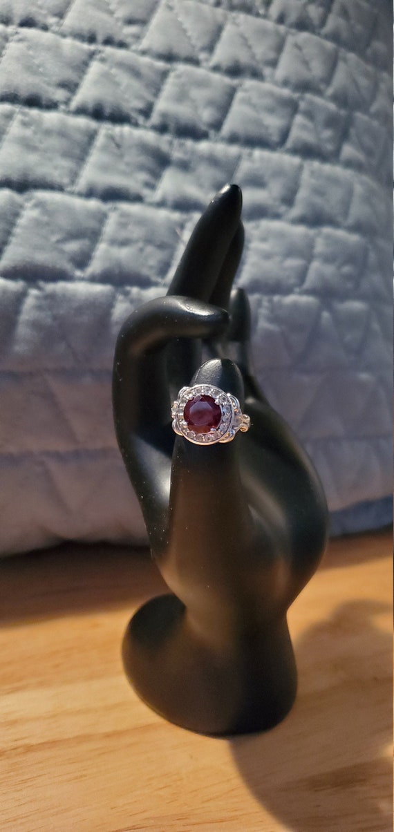 Garnet and white topaz ring