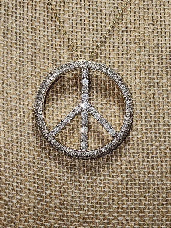 Peace Sign in 14k yellow gold approx 2ct