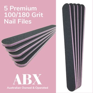 May include: Five black nail files with pink and white stripes. The files are 100/180 grit and are stacked on top of each other. The text "5 Premium 100/180 Grit Nail Files" is above the files. The text "ABX Australian Owned & Operated" is below the files.