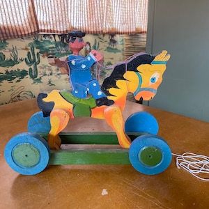 Vintage Folk Toy Horse and Rider with Guitar on Wheels