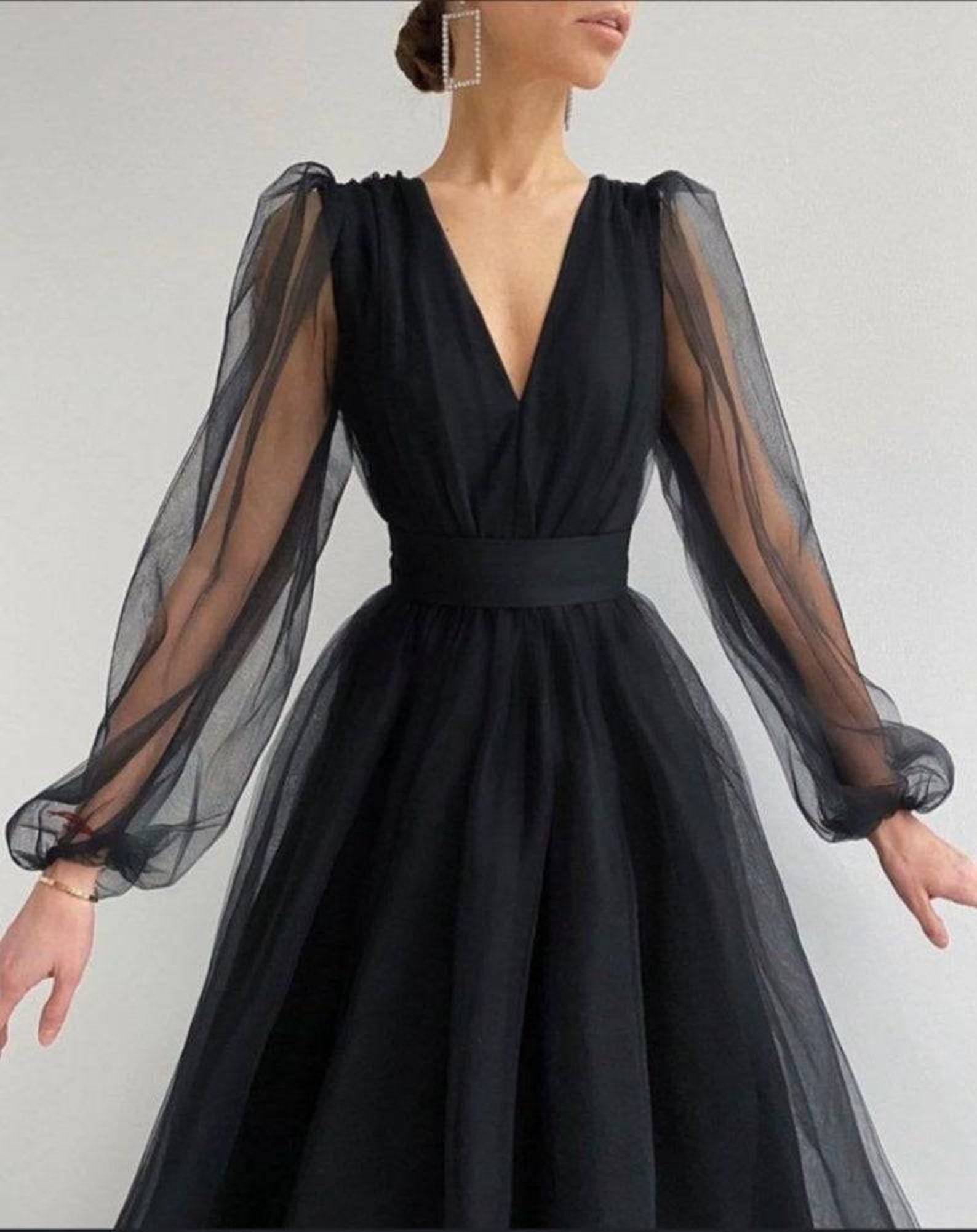 black gown with sheer sleeves