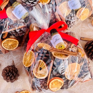 Christmas festive pot pourri, natural or scented, consisting of pine cones, cinnamon sticks and slices of orange. NEW CHEAPER 2025 PRICES