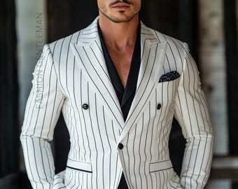May include: A white suit with black vertical stripes. The suit jacket has a double-breasted closure and a pocket square.