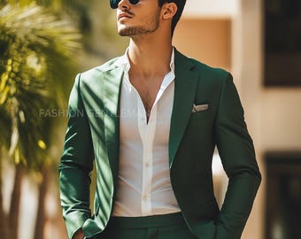 May include: A man wearing a dark green suit with a white button-down shirt and sunglasses. The suit is a two-piece suit with a jacket and trousers.