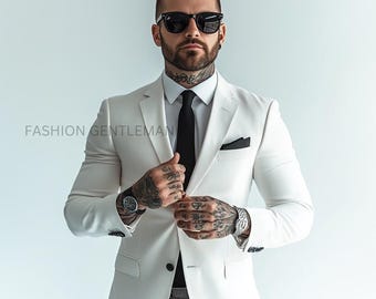 May include: A man wearing a white suit jacket with a black button-down shirt and black tie. He is wearing black pants and black sunglasses. The text "FASHION GENTLEMAN" is visible in the lower left corner of the image.