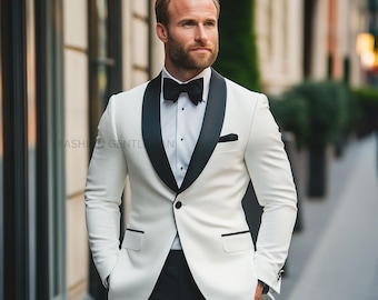 May include: A white tuxedo jacket with a black satin shawl collar and a single button closure. The jacket has a slim fit and is made of a smooth fabric.