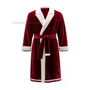 May include: A long, red robe with a white faux fur collar and trim. The robe has a self-tie belt and a shawl collar.